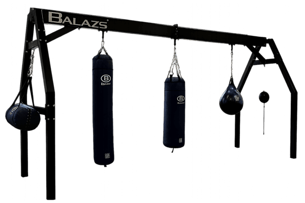 Balazs Large A-Frame heavy bag stand installed in an athletic training room with two bags