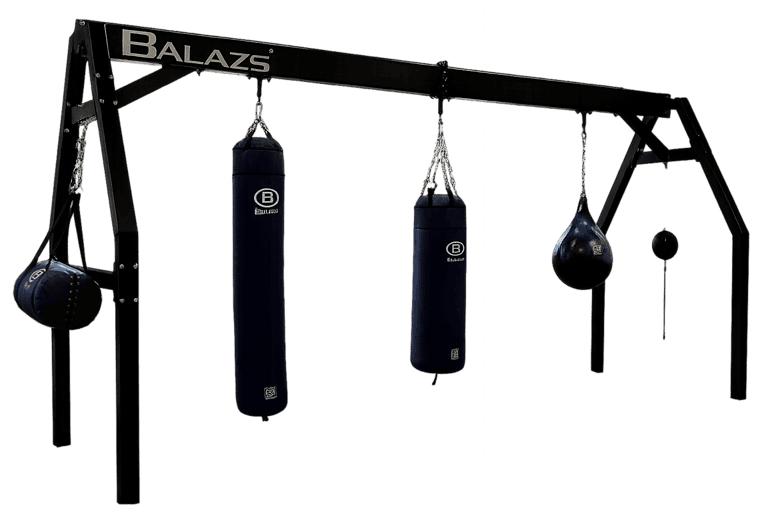Balazs Large A-Frame heavy bag stand installed in an athletic training room with two bags