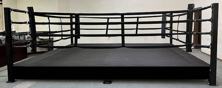 Balazs low-profile elevated boxing ring with black canvas