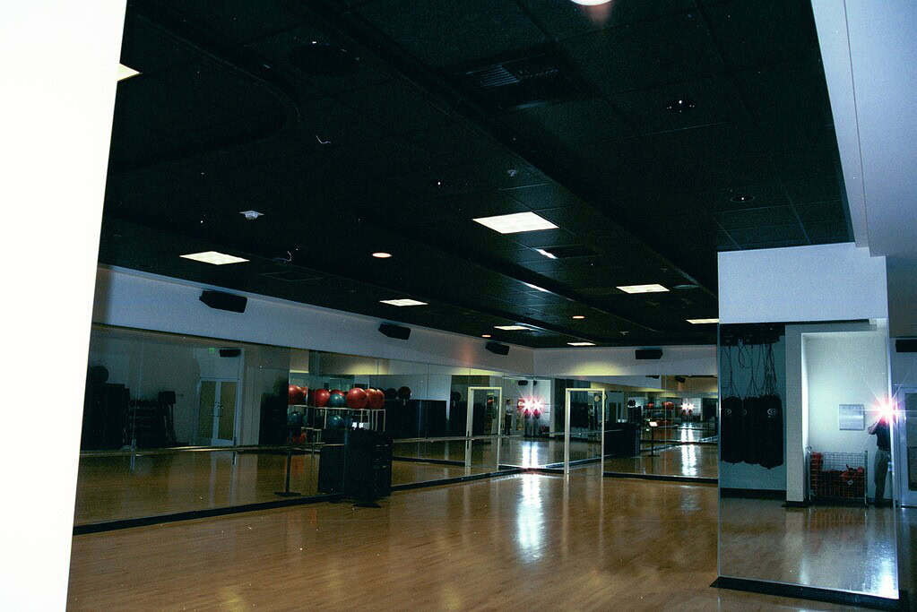 Health club studio with the floor completely clear after Balazs heavy bags were stored on the Ultra-Trak track