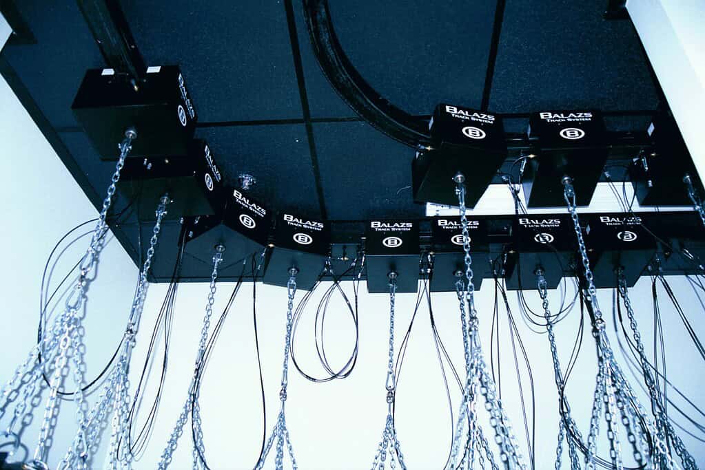 Looking up a Balazs Ultra-Trak track run showing the trolleys and hanging chains