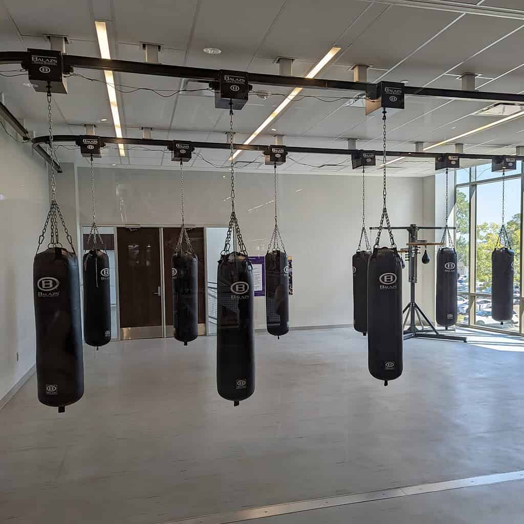 Balazs Ultra-Trak ceiling track with heavy bags deployed in a university training studio