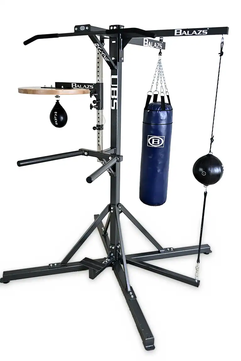 Balazs four-station Universal Boxing Stand with heavy bag, speed bag, double-end bag, pull-up bar, and dip bars