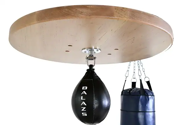 Underside of a Balazs UBS maple speed bag platform with swivel and black speed bag